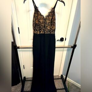 Super classy, long black romper